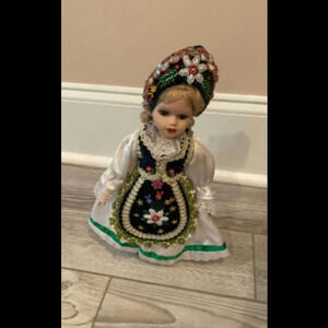 Porcelain doll (~a foot tall or less)